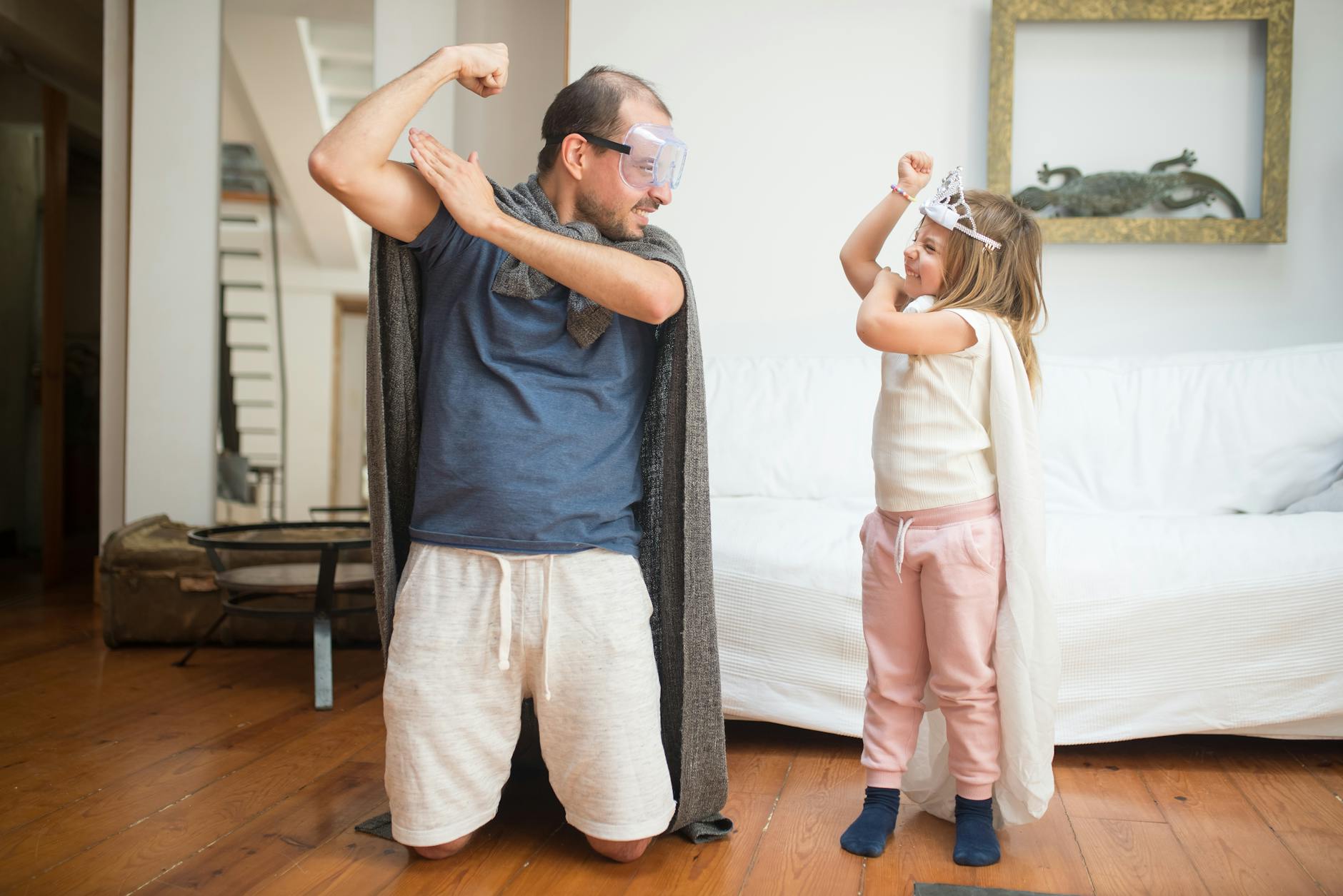 father and daughter playing together