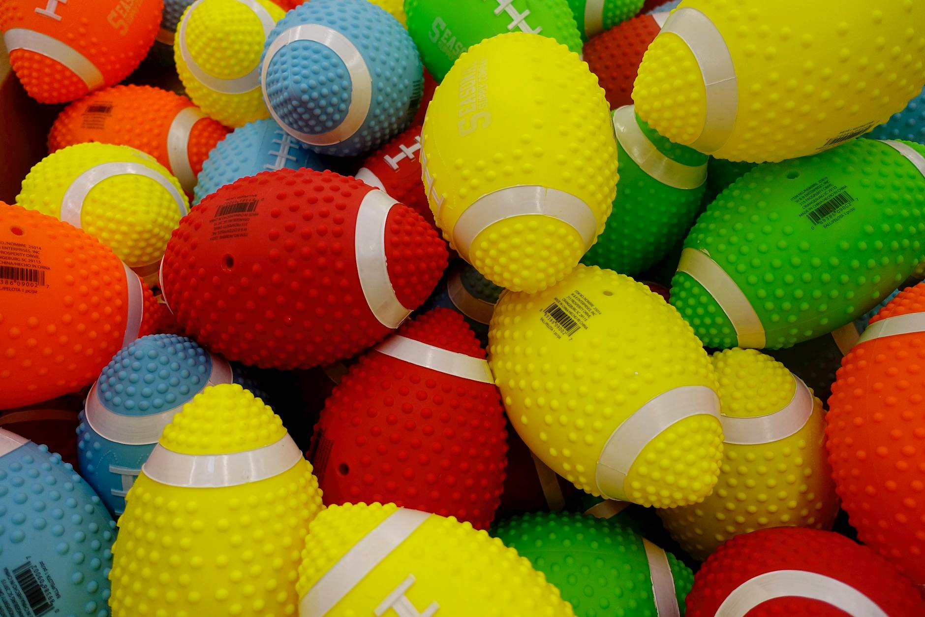 footballs in different colors