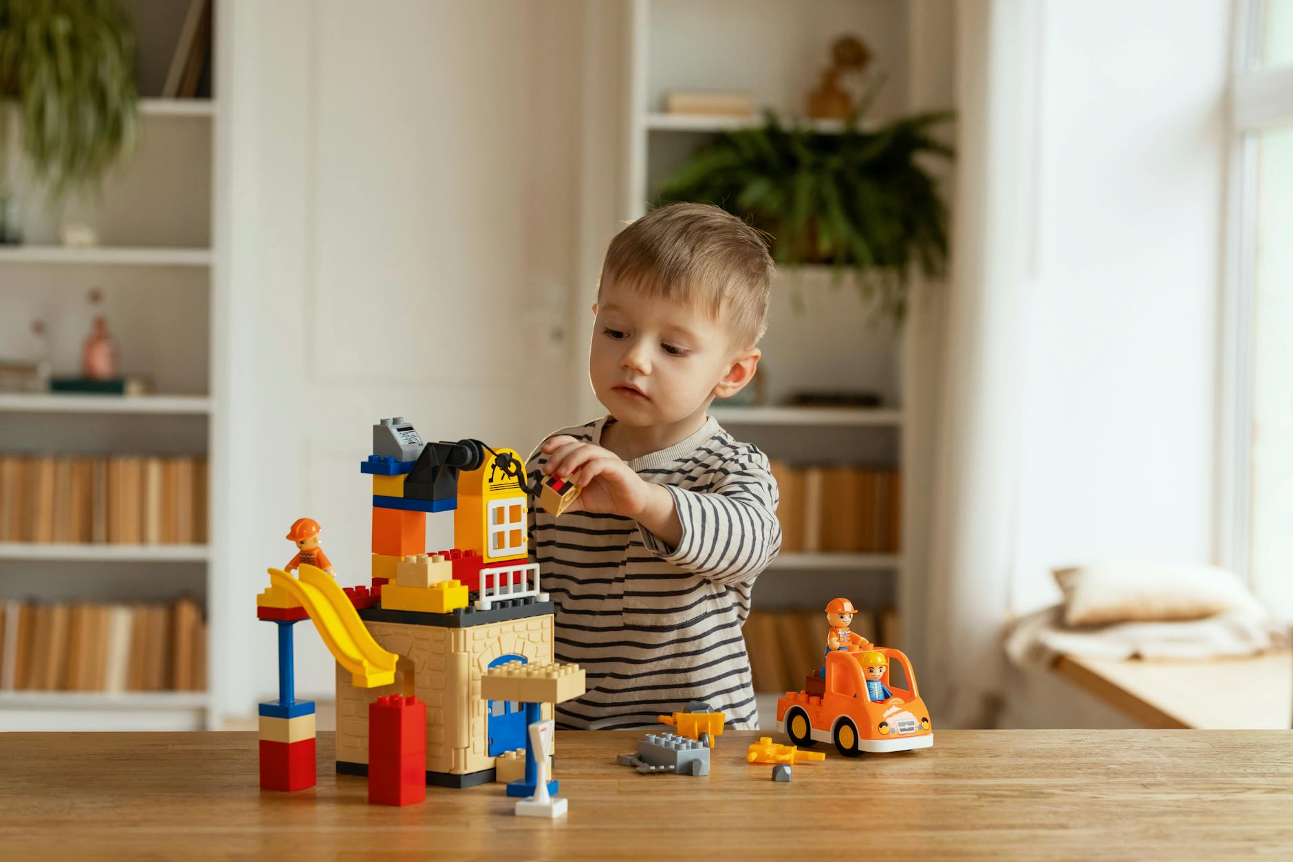 boy playing with toys