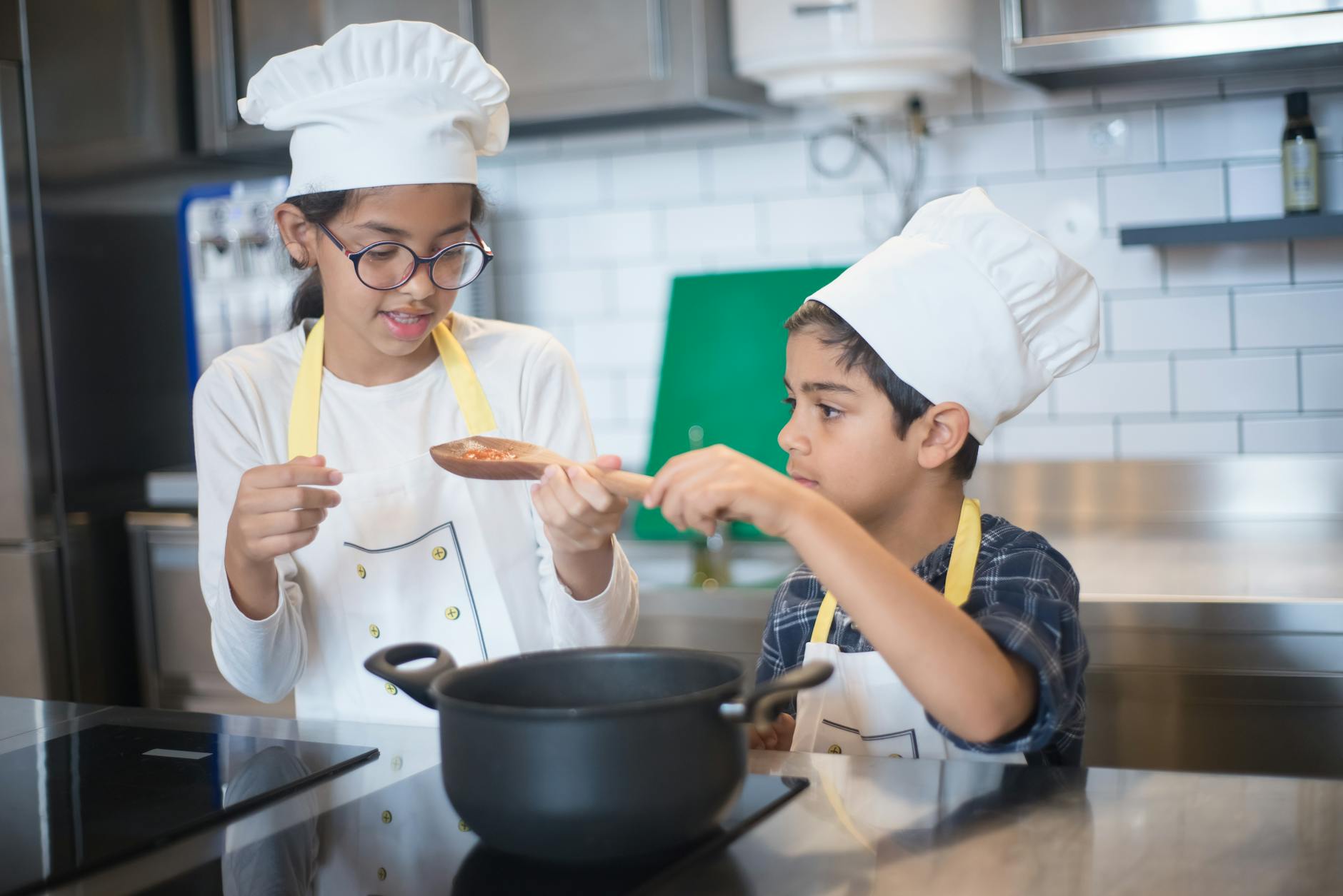 children cooking in the kitchen