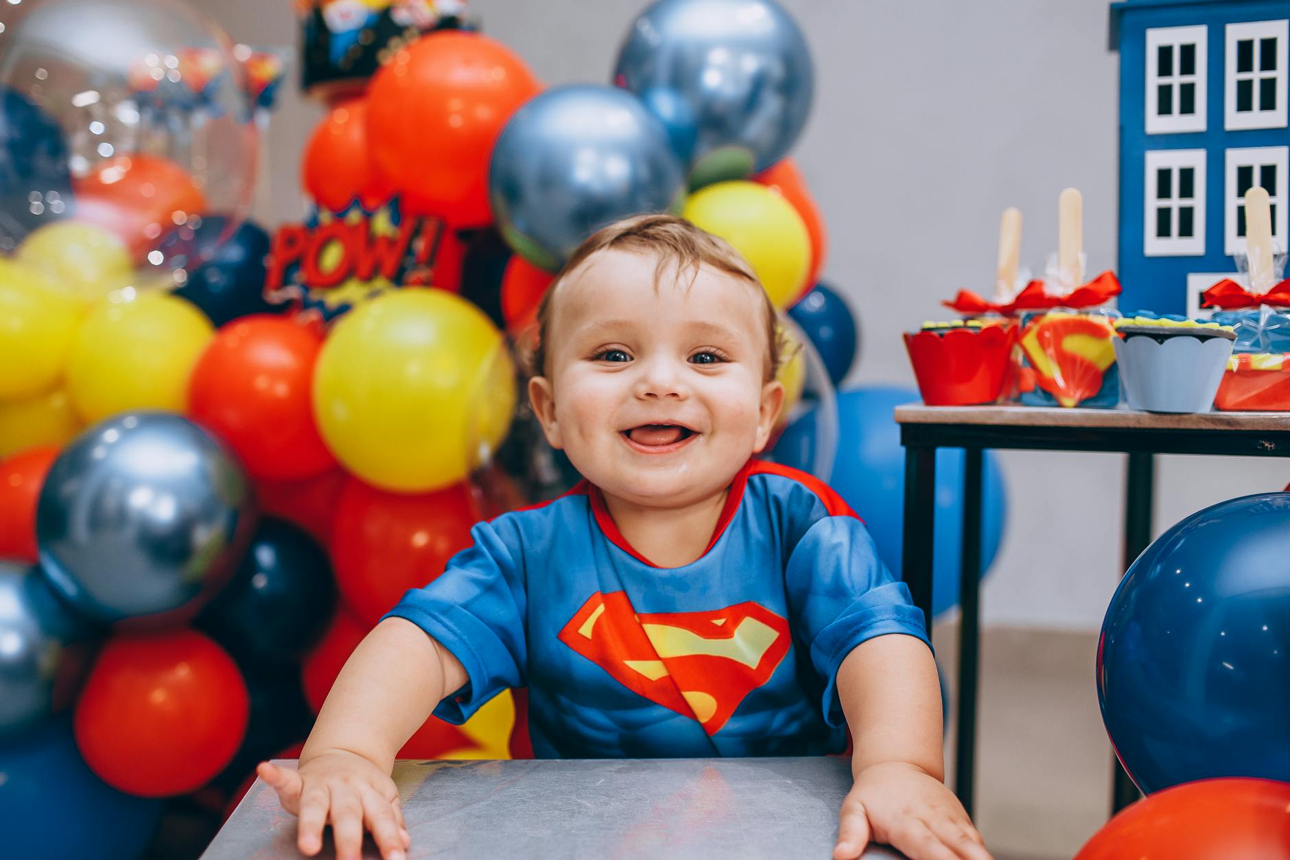 boy wearing a superhero shirt