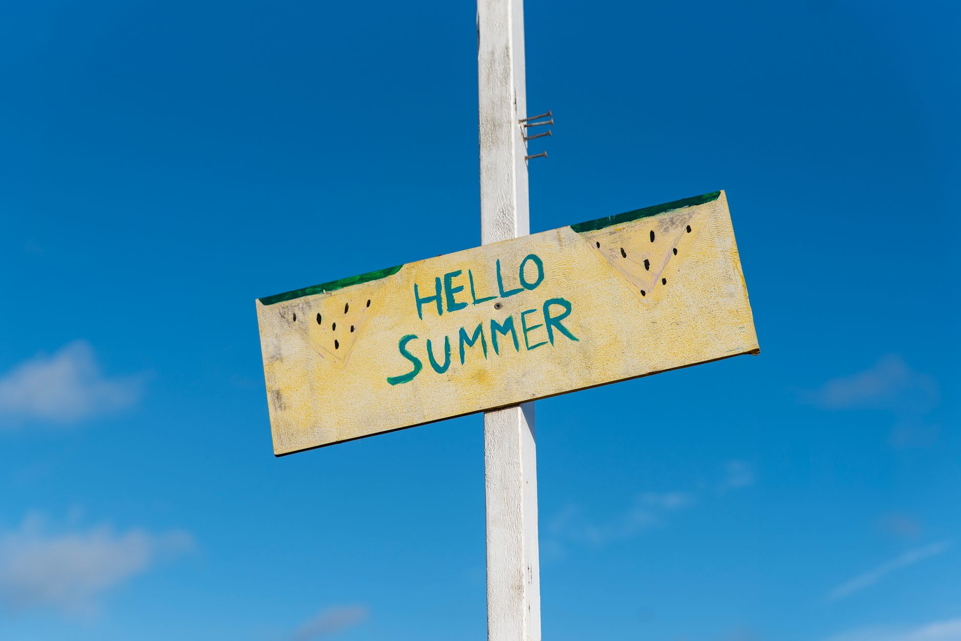 vibrant signboard celebrates summer outdoors