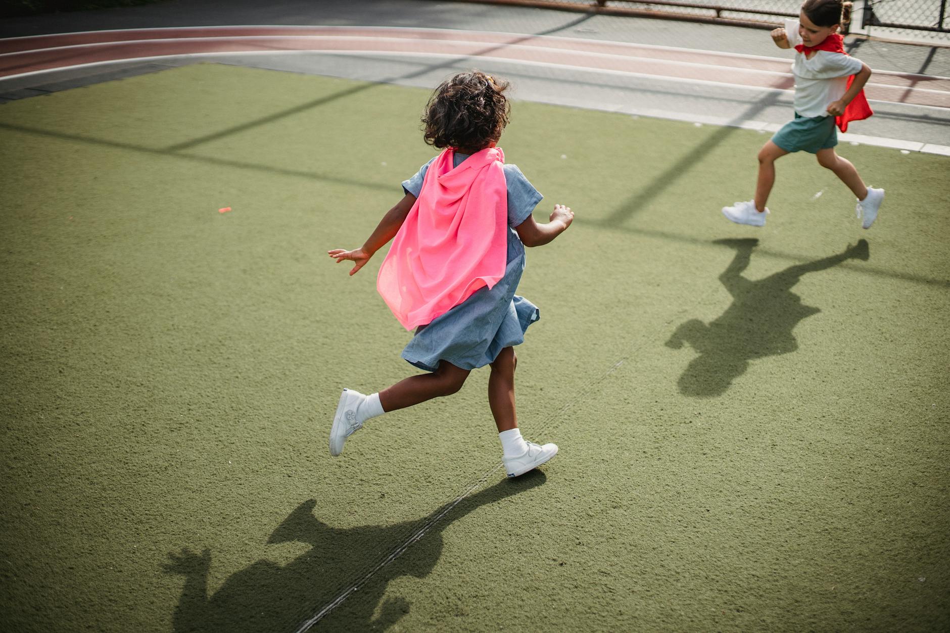 girls running on the playground