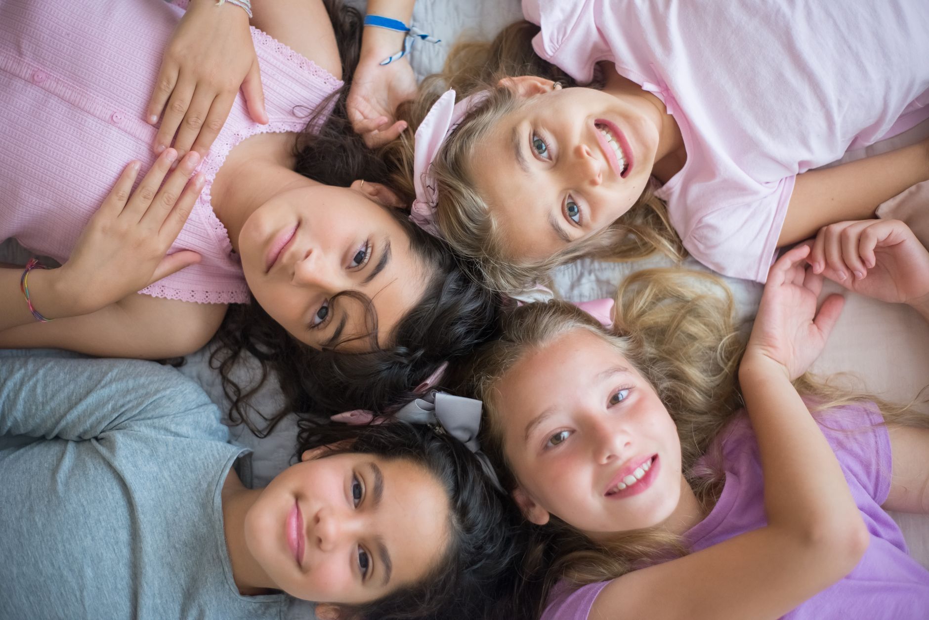 overhead shot of children smiling