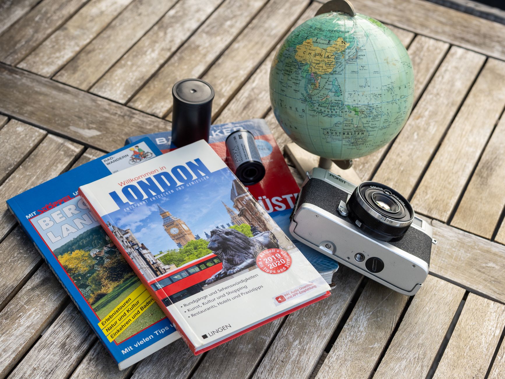 vintage travel kit with camera and guides
